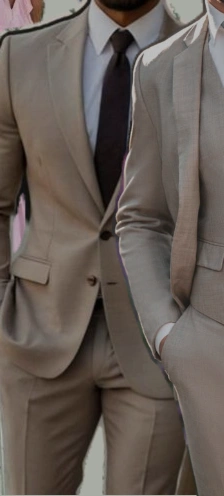 Taupe fitted suit with a dark tie from the supplied outfit reference