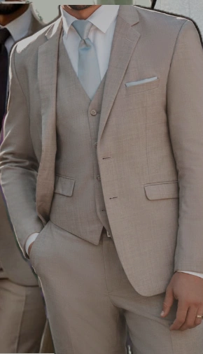 Grey three-piece suit with a pale blue tie from the supplied outfit reference